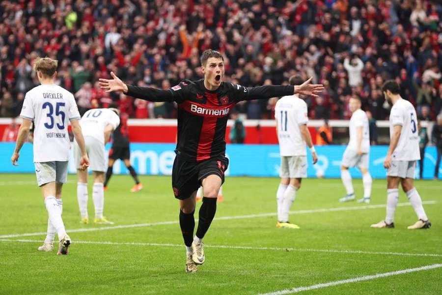 Bayer Leverkusen rallied to secure a 2-1 win against Hoffenheim, avoiding their first season defeat in the German Bundesliga.